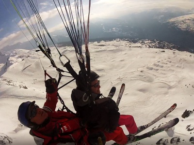Paragliding ski flight over Les Arcs resort