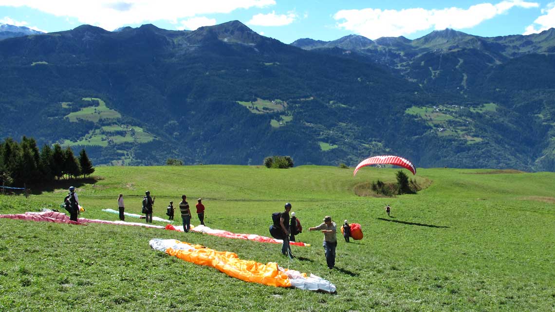 Paragliding school slope, first flea jumps